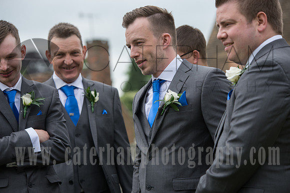 Surrey wedding photographer godstone church wedding The grooms-maids with blue ties
