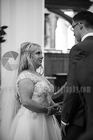 Surrey wedding photographer godstone church wedding Groom and Maids talking