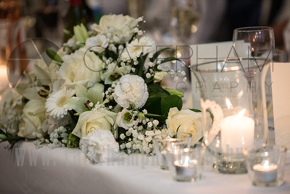 Surrey wedding photographer- Chiddingstone Castle- wedding flowers on table