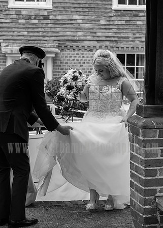 Surrey wedding photographer godstone church wedding The bride arriving to the ceremony