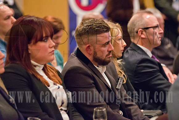 surrey event photographer-BNI event- people listening to someone speaking