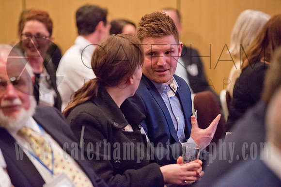 Surrey event photgrapher-Business network meeting- people talking to each other