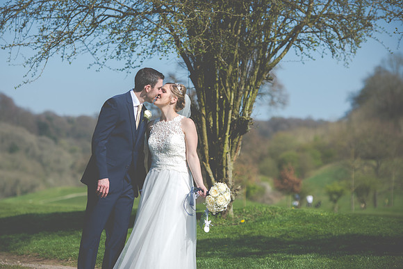 Surrey wedding photographer / woldingham golf club wedding /stealing a kiss