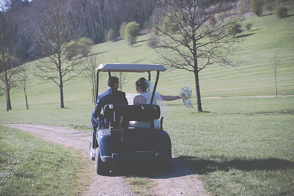 Surrey wedding photographer / woldingham golf club wedding /going off in a buggy 14