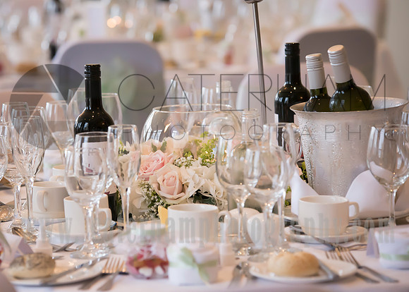 Surrey wedding photographer / selsdon park hotel wedding wine at the table 27
