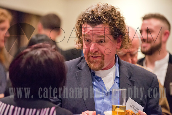 surrey event photographer- business man and woman talking