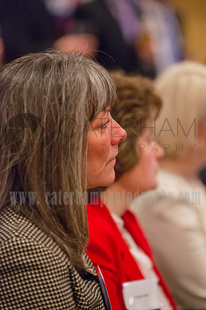 surrey event photographer- women sat in meeting