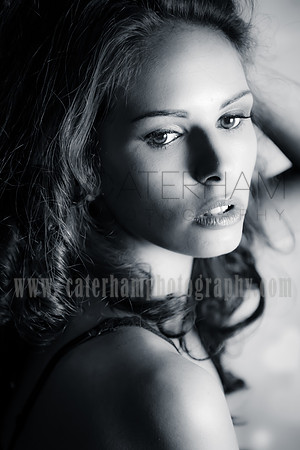 Surrey portrait photographer- in studio -woman leaning over