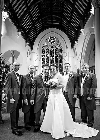 St Pauls Church, East Molesey wedding - Wedding photographer in Surrey  / The wedding couple with grooms-maids