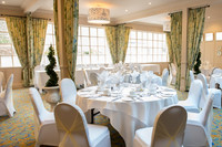 Surrey wedding photographer / cheap Wedding venue Reigate Manor Hotel / The wedding reception and decorations/ Nice and cheap weddings