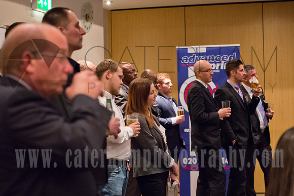 surrey event photographer- colleagues having drinks together
