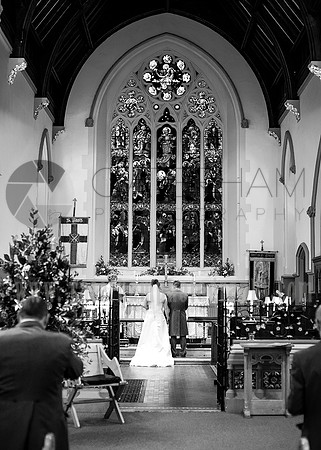 St Pauls Church, East Molesey wedding - Wedding photographer in Surrey / Wedding couple standing at the altar